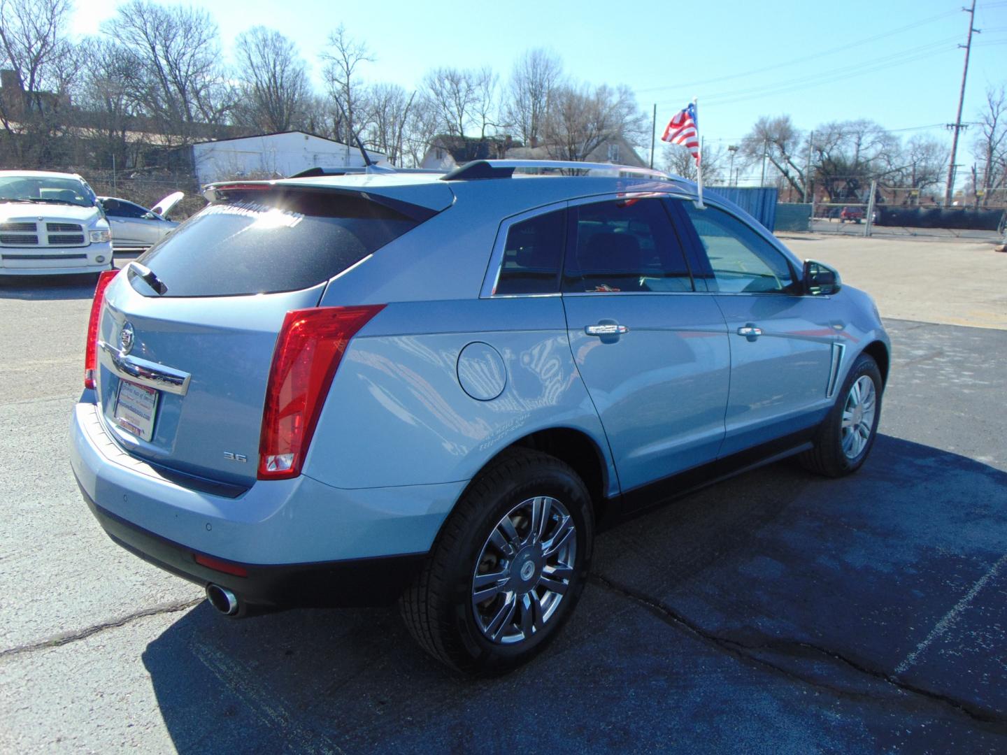 2013 Blue Cadillac SRX (3GYFNCE3XDS) with an V6 Flex Fuel 3.6 Liter engine, Auto, 6-Spd w/TAPshift transmission, located at 2105 Dixie Hwy, Louisville, KY, 40210, (502) 772-3333, 38.220932, -85.795441 - Photo#10